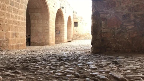 Tracking Shot of Medieval Monastery Courtyard. Tourists Exploring Old Monastery Stock Footage 90833878