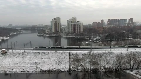 Tracking shot the movement of a high-speed passenger train on a bridge Stock Footage 144323963