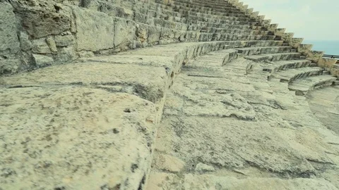 Tracking shot Moving up the steps of an ancient amphitheater Kourion Cyprus Stock Footage 76633310