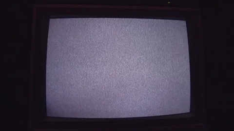 Tracking Shot Moving Towards Static on A Vintage Television Screen Stock Footage