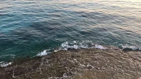 Tracking Shot of the Ocean at Sunset Stock Footage 115185035