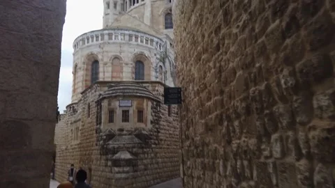 Tracking shot in the old city of jerusalem. christian church Stock Footage 145867682