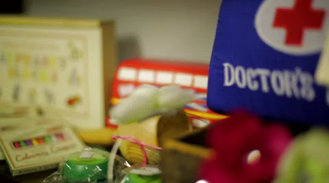 Tracking shot old fashioned childrens toys Stock Footage 44288248