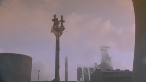Tracking shot of the outside of a factory Stock Footage 312272896