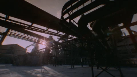 Tracking shot of the outside of a factory Stock Footage 312272980