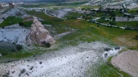 Tracking shot over landscape with vehicles on road Stock Footage 100890034
