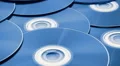 tracking shot over a pile of discs 1/8 4k or 4k+ Resolution