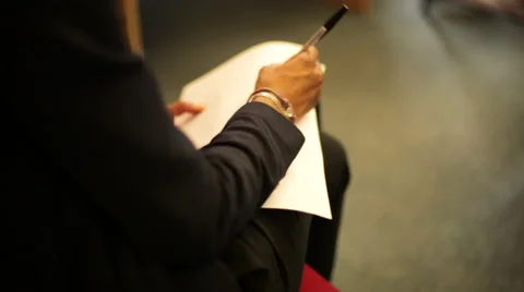 Tracking shot over the shoulder writing and taking notes Stock Footage 44251827