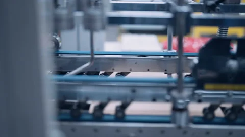 Tracking shot, packaging printing line in printing house. Stock Footage 197463112
