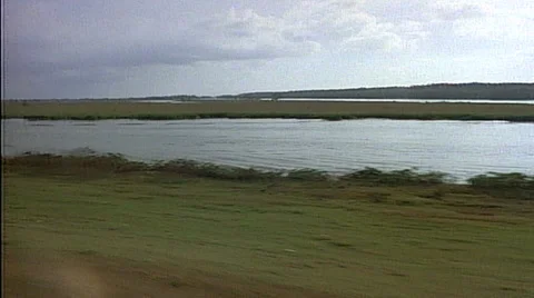 Tracking shot of passing boat on river Stock Footage 29807237