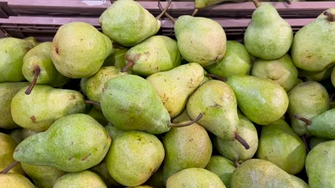 Tracking shot on pears in crates in top view Stock Footage 300994746