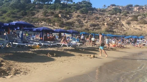 Tracking Shot Of People At The Beach Video stock 123533129