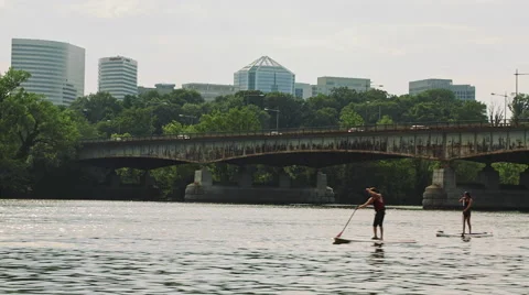 Tracking shot of People kayaking on the Potomac river. Georgetown, Washington DC Stock Footage