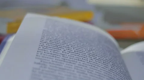 Tracking shot on  pile of the books on the table Stock Footage 47827178