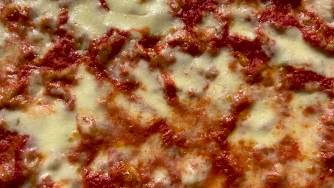 Tracking Shot of a pizza in top view with close framing Stock Footage 306783296