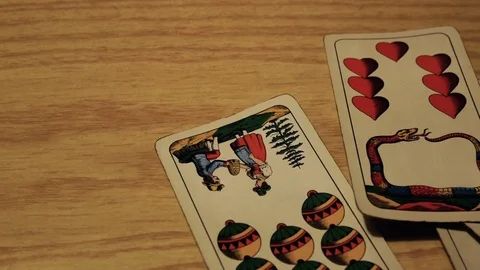 Tracking shot on playing cards, gambling addiction Video stock 87680663
