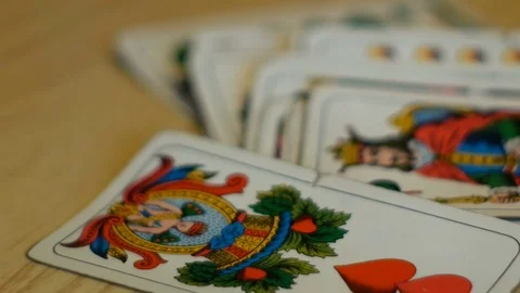 Tracking shot on playing cards on table Stock Footage 84317692