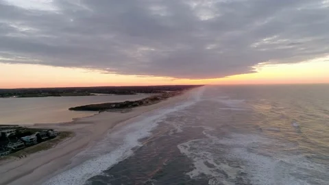 Tracking shot on private beach with gorgeous sunset Stock Footage 155464599