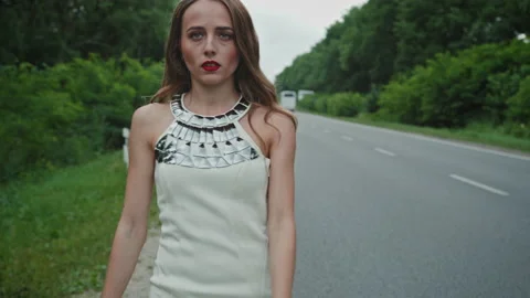 Tracking shot of prostitute walking near road Stock Footage 220621753