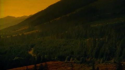 Tracking shot right to left of Colorado Rockies at sunrise Stock Footage 29808053