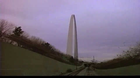 Tracking shot right to left of St. Louis Arch, approaching tunnel into and out Stock Footage 29804820