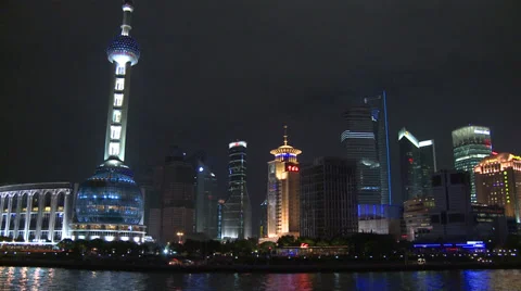 Tracking shot from river,  Oriental Pearl TV Tower Stock Footage 37892249
