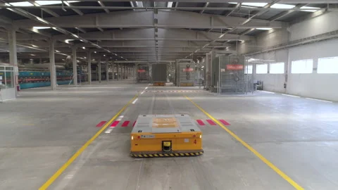 Tracking Shot Robotic Carrier Moving in a Ceramic Tile Plant Stock-Footage 167568610
