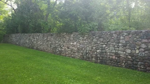 A tracking shot of a rock wall 4K Stock Footage 135168640