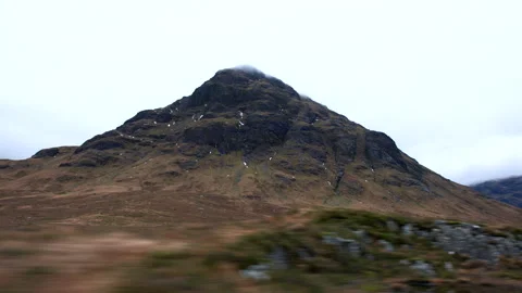 Tracking Shot of Rugged Mountain Peak in Scottish Highlands Stock Footage 328164572