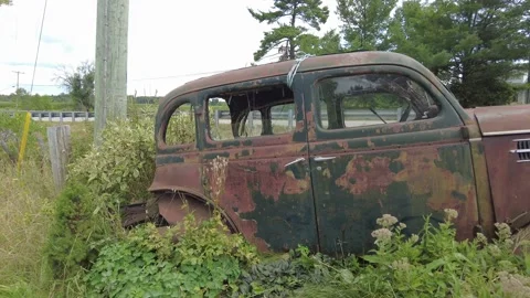 Tracking shot of a rusty old car Stock Footage 205551114