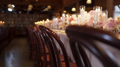 Tracking shot of a rusty wedding reception dinner decoration Stock Footage 135213034