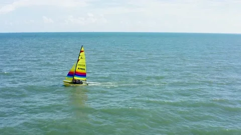Tracking shot of a sailboat in open water Stock Footage 202054009