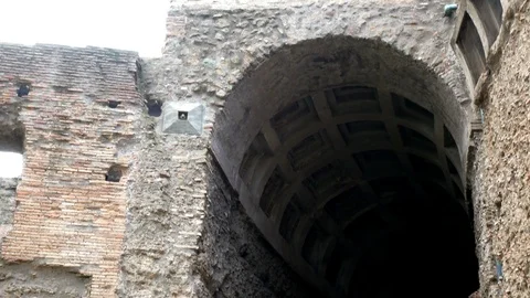Tracking shot on a small arch in the ruins of Avventino, in the center of Rome Stock Footage 89900714
