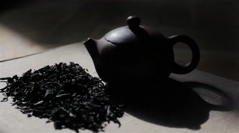 Tracking shot of small stylish dark tea pot. Tea ceremony Stock Footage 50965231