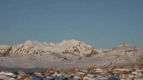 Tracking shot of snow capped mountains in Veneto, Italy. Stock Footage 149439183