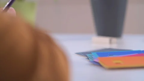 Tracking shot of someone sketching in notebook 3 Stock Footage 124188985