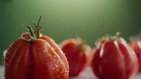 TRACKING SHOT ON A SPINNING TOMATO Stock Footage 132797657