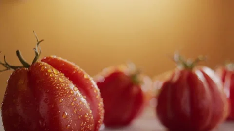 TRACKING SHOT ON SPINNING TOMATO Stock Footage 132820123