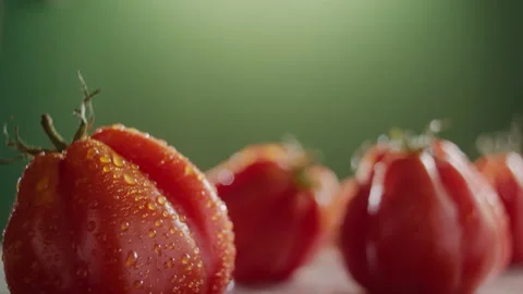 TRACKING SHOT ON SPINNING TOMATO Stock Footage 132865896