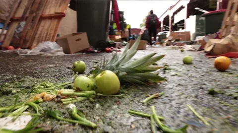 Tracking shot of squashed fruit and vegetables at a market Stock-Footage 40030626