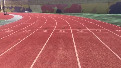 Tracking Shot of a Stadium Track. GSP Stadium Track Surface Stock Footage 133570475