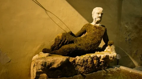 Tracking shot on the statue of the babuino, is the representation of a "lying Stock Footage 98229605