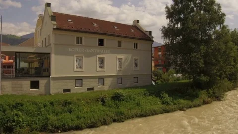 Tracking shot on stream of Brunico city Video stock 79684302