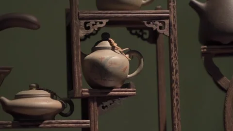 Tracking shot of teapot collection Stock Footage 292945456