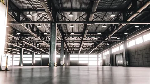 Tracking shot through empty warehouse or hangar Stock Footage 165470115