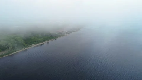Tracking shot through overcast clouds on ocean Stock Footage 155463312