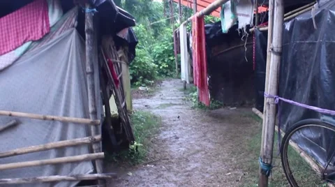 Tracking shot through relief camp in India Stock Footage 58862527