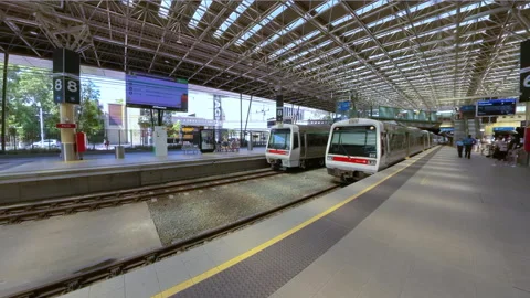 Tracking shot of train arriving at train station in Perth Video stock 236990434