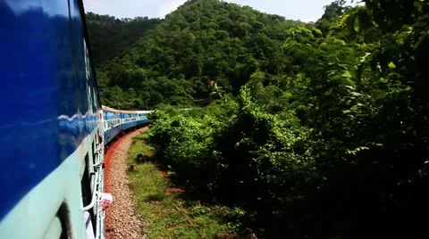 Tracking shot of a train moving in the Araku Valley Stock Footage 30045283