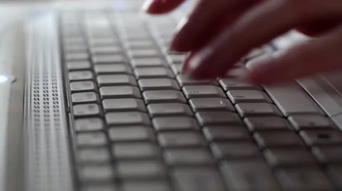 Tracking shot of typing on laptop keyboard Stock-Footage 935665